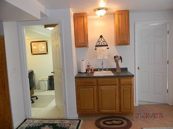 wet bar just infront of large utility room