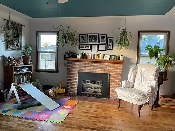 Coved plaster ceilings and restored hardwood floors.