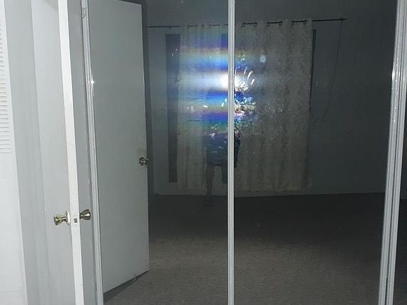 Bedroom with ample closet space