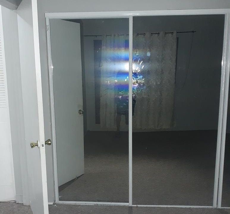 Bedroom with ample closet space