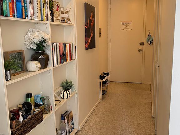 Built-in bookshelf in hallway