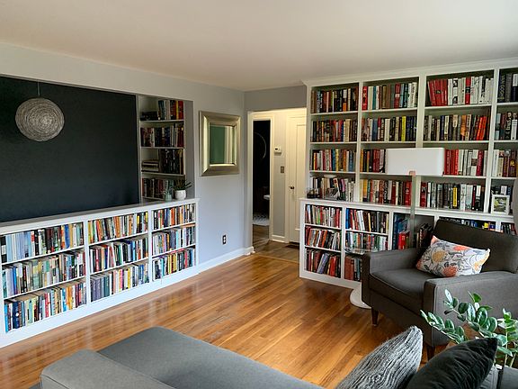 Living room (photo taken from front door). Good natural light.