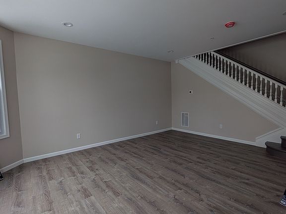 spacious and bright living room and dining room off of the front entrance