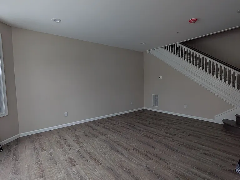 spacious and bright living room and dining room off of the front entrance