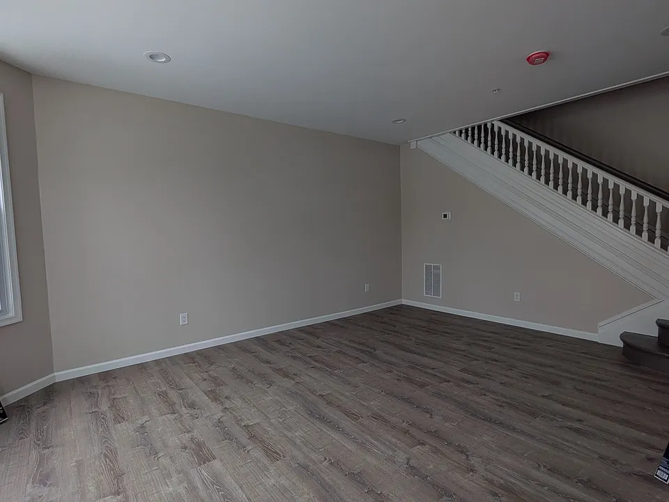 spacious and bright living room and dining room off of the front entrance