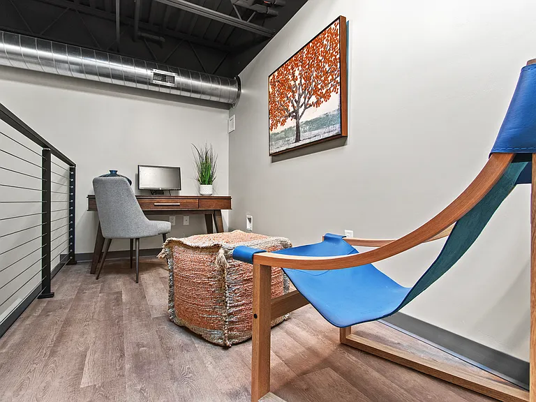 Work from home, elevated. Cable railing loft, skylight views, and plenty of space to focus