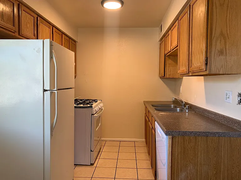 Adorable Fourplex Nestled in Four Hills — Photo 3