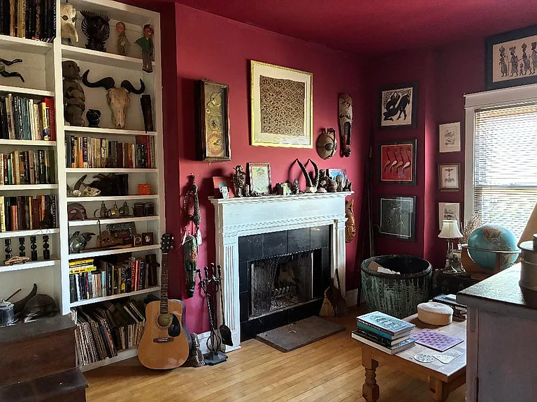 library with wood burning fireplace