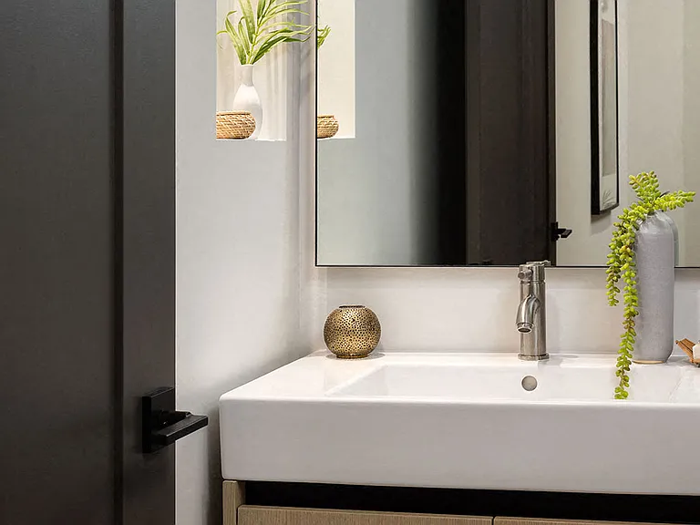 Bathrooms with beautiful built-ins and lighting