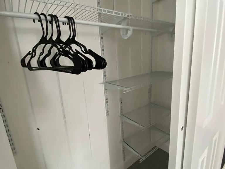 Generous closet with hangers included.