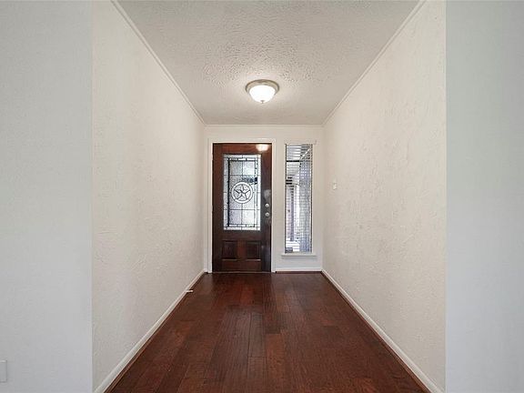 Foyer/entry way with tile flooring.