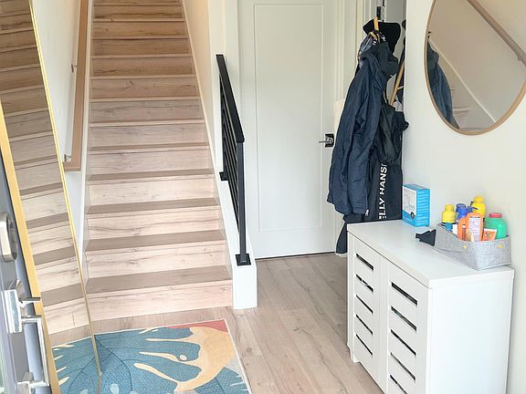 1st floor - entry way (office nook to the right with guest bathroom and bedroom ahead to the right)