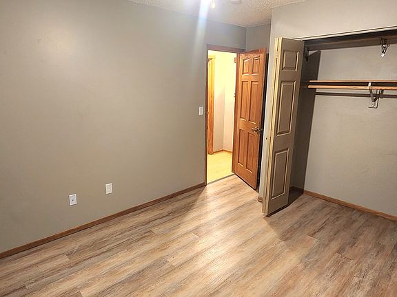 Main level bedroom with patio