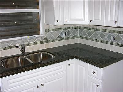 Custom Branite and backsplash throughout the home