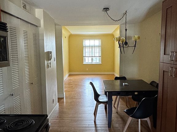 Living and dinning area, kitchen view.
