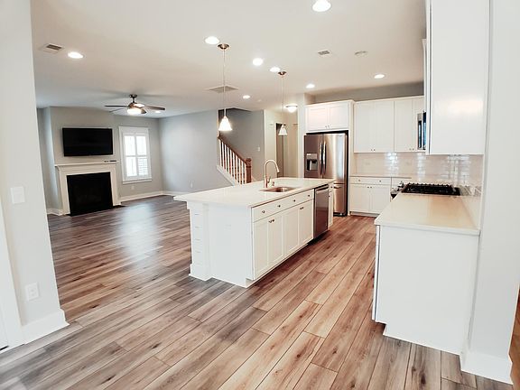 Gourmet Kitchen - living and fireplace
