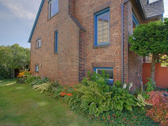 North-side of home has a lovely, lush hosta garden