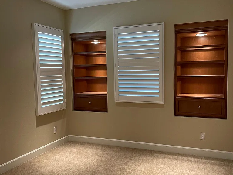 Bedroom 1 with built-in shelves