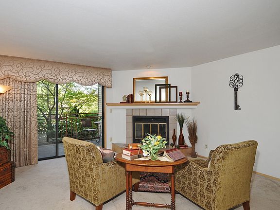 Living room with wood burning f