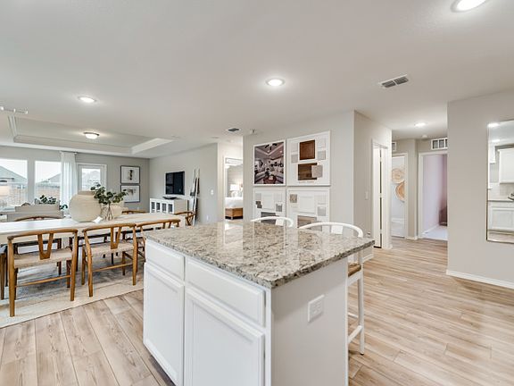 Model representation -Island kitchen overlooking gathering room