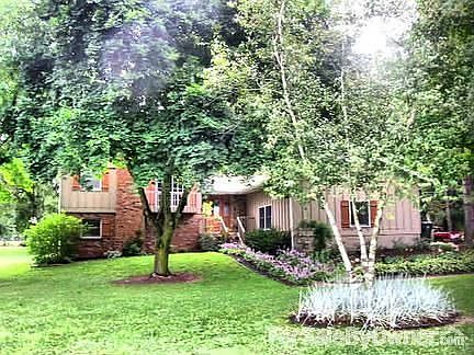 Great curb appeal!
						:
						House sits back from road surrounded by mature shade trees and landscaping.