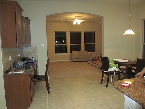 Nook and Family Room
(Additional built-in cabinets and desks with drawers provides ample storage space)