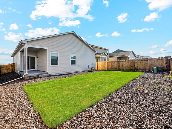 The back yard of the Arapaho is fully-fenced.
