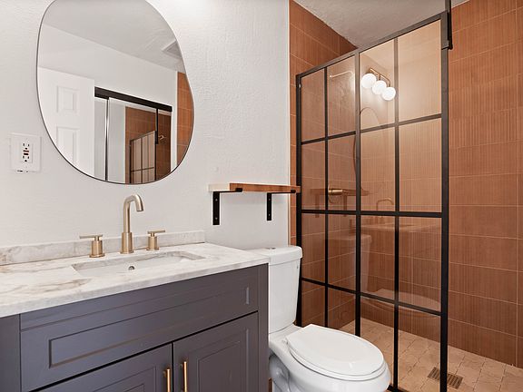 Beautifully updated bathroom with custom shower!
