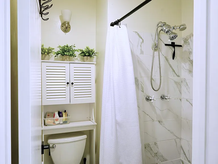 Secondary bathroom with updated shower