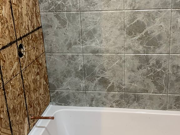 New bath and enclosure 