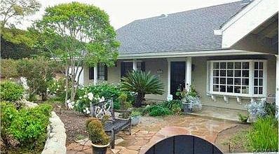 Front garden welcomes you home.