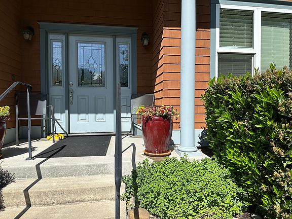Spring plants and front porch seating