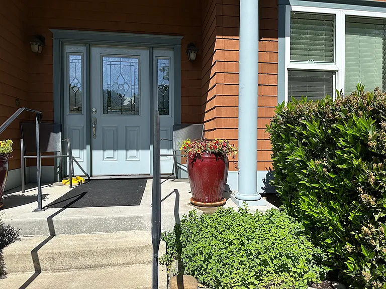 Spring plants and front porch seating