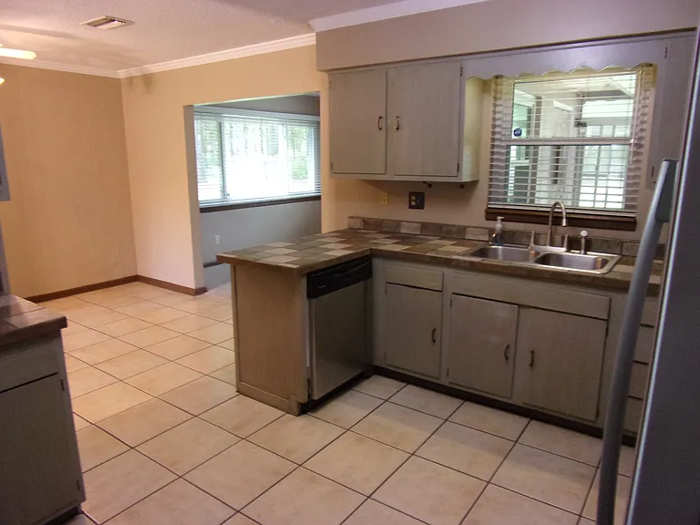 KITCHEN WITH TILED COUNTERS AND CUSTOM REFURBISHED CABINETS - NEW BLINDS - STAINLESS STEEL APPLIANCES - PANTRY