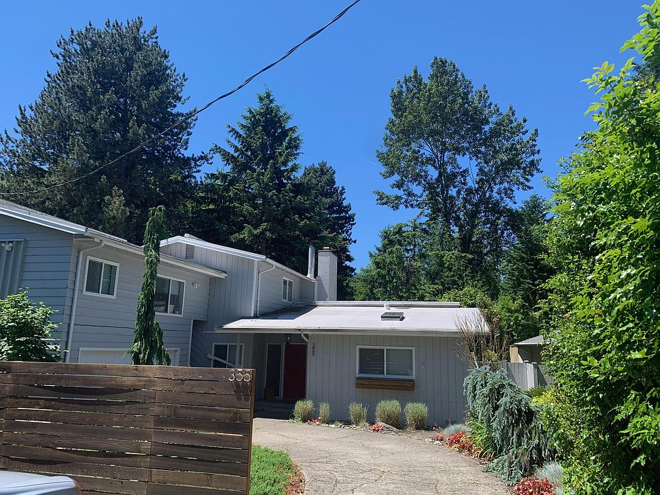 long driveway for additional parking. triplex with only one unit above, only over kitchen of lower unit