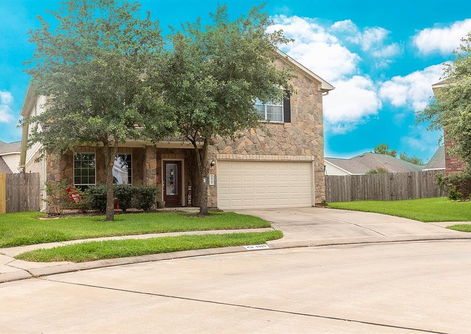 Home has a huge pie shape lot with massive back yard on a friendly cul de sac circle. LOW TAXES and NO FLOODING!