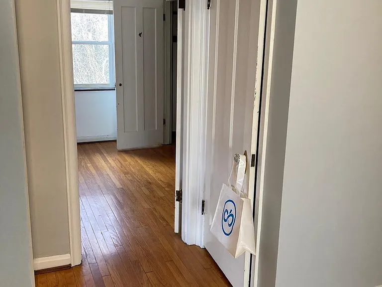 View from kitchen eating space into bedroom
