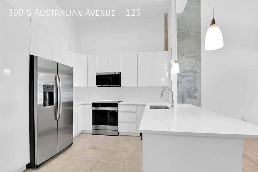Desirable & spacious 2-story townhome with dramatic 16-20 ft ceilings — Photo 2