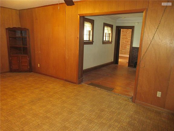 Living room is spacious and opens on to the den.