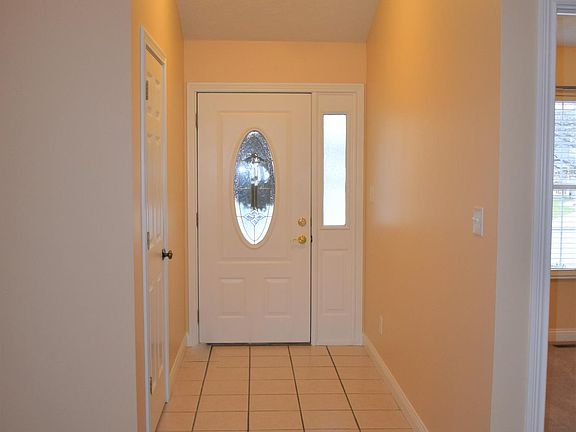 Formal entry has ceramic tile flooring and a coat closet.
