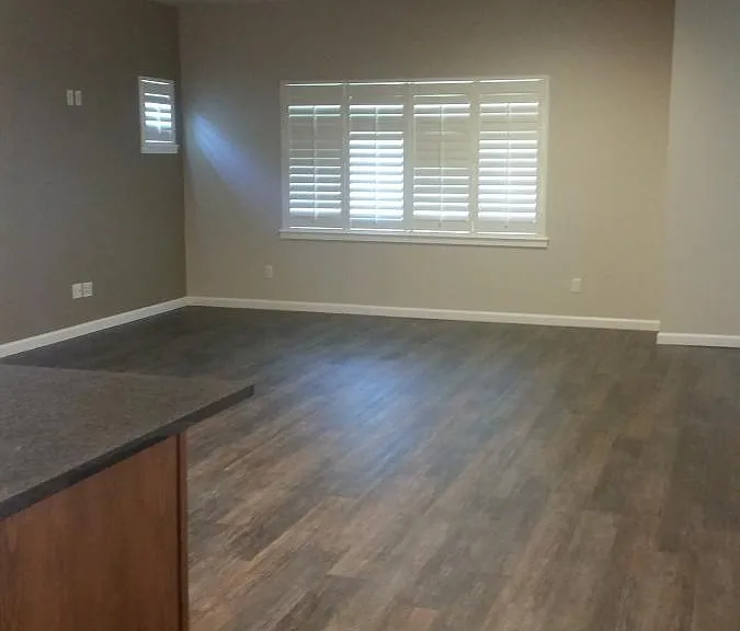 Living Room with Recessed lighting, 9 ft ceilings and Luxury vinyl plank throughout main floor.
