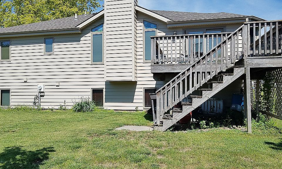 Rear view of home and deck