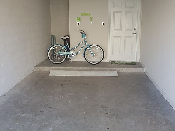 1-car garage with driveway space behind