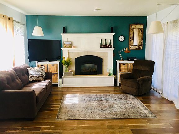 French doors to the right of the mantle.