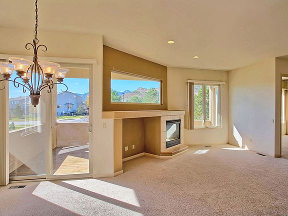 Great Room with 10'+ Ceilings, Walk-Out and Mountain Views