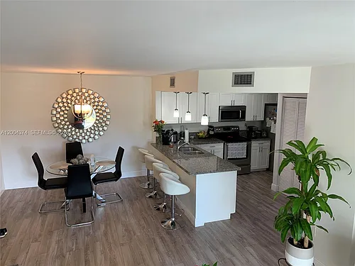 8660 SW 212th St #305 Photo 1
