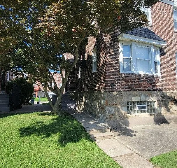 7703 Woolston Ave — Photo 2