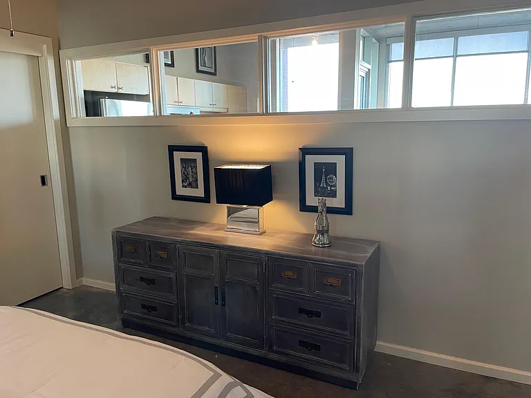 Bedroom dresser for storage.