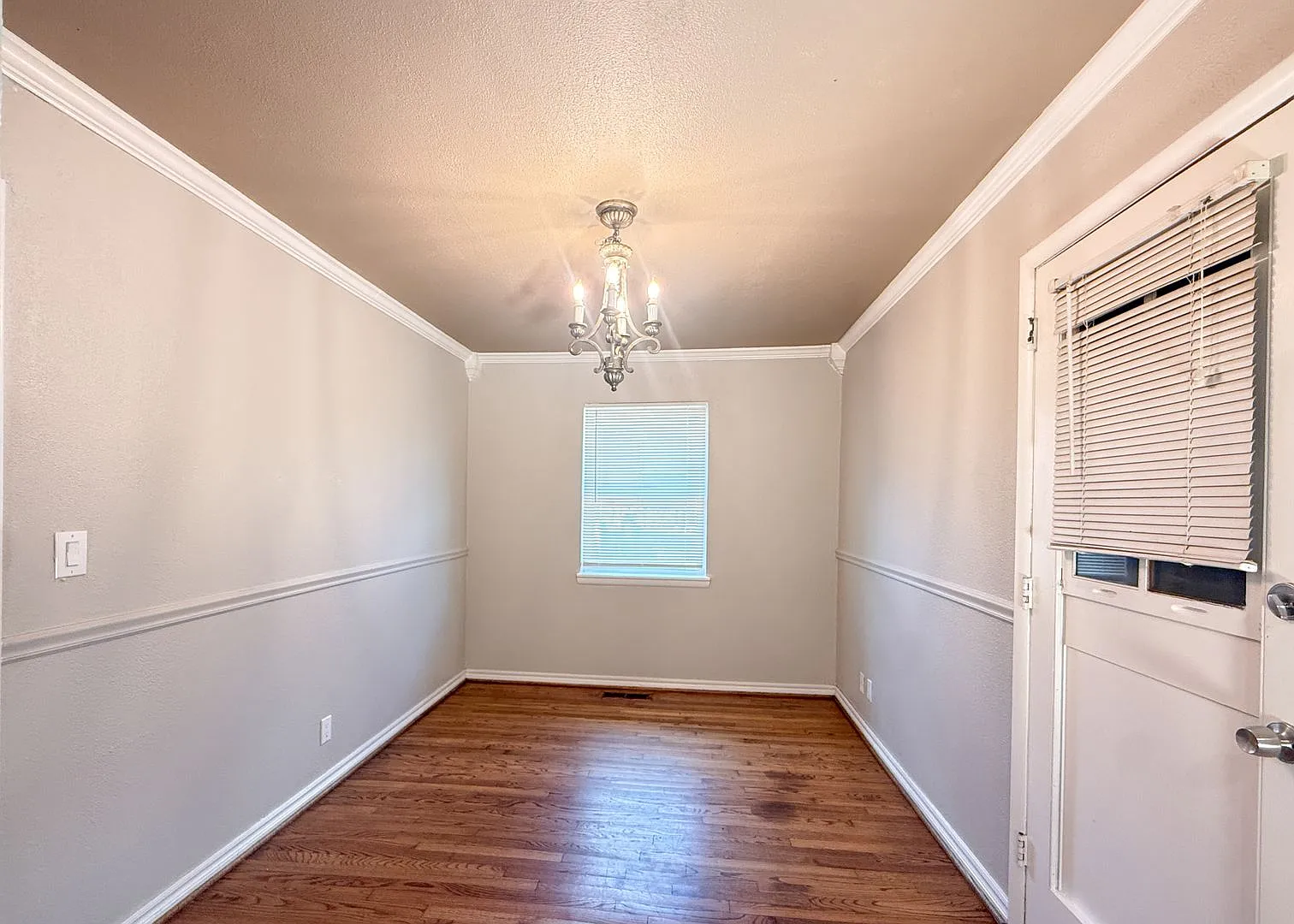 3116 NW 65th St | Hardwood Floors + Sunroom | NW OKC — Photo 4