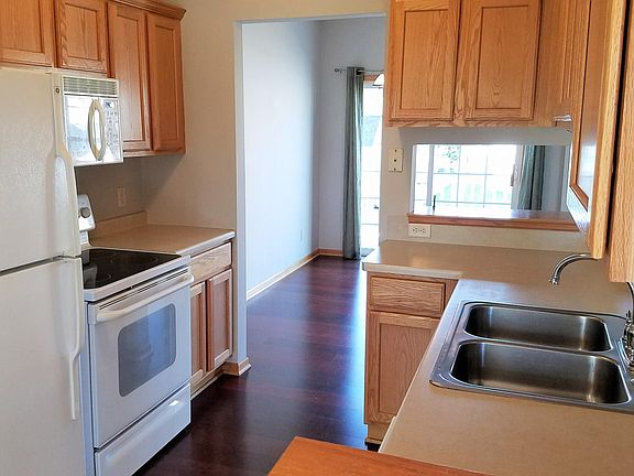 Galley kitchen includes all kitchen appliances